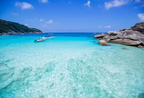 Boats anchored in turquoise waters of Similan Islands, Thailand.