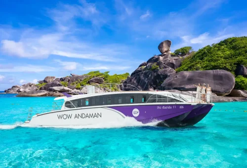 Wow Andaman speedboat catamaran in turquoise waters of Similan Islands, Thailand.