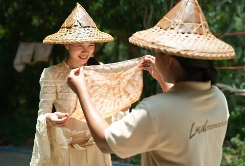 Guest learning traditional tie-dye fabric making in Khao Lak village.