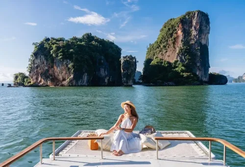 Woman relaxing on private boat deck in Phang Nga Bay