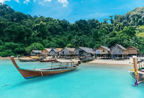 Traditional Moken village on Surin Islands with wooden stilt houses.