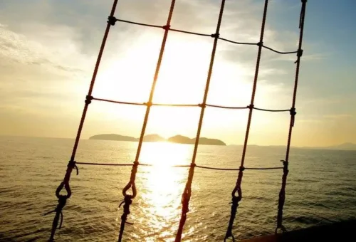 Sunset view over Andaman Sea from traditional boat