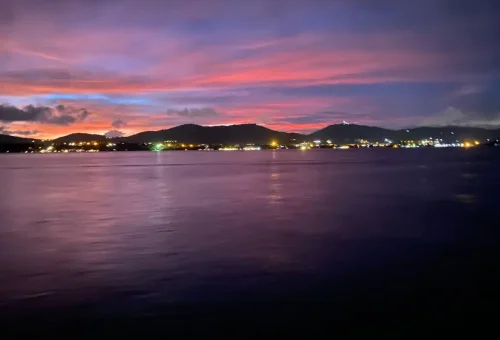 Purple and pink sky during sunset near Phuket coastline