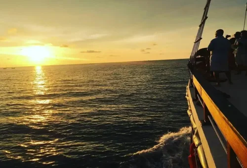 Golden sun setting over Andaman Sea from Phuket boat