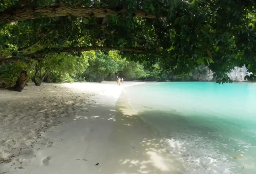 Hidden beach with turquoise waters and white sand on Koh Hong Krabi, Thailand.