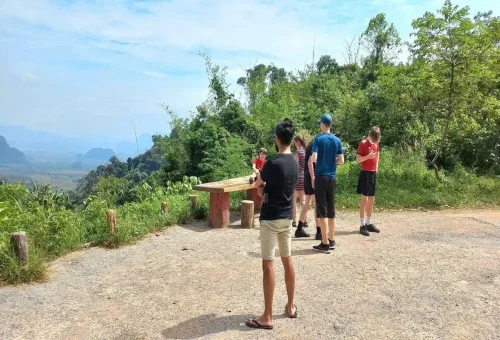 Tourists enjoying Khao Sok Discovery viewpoint during river canoe day trip.