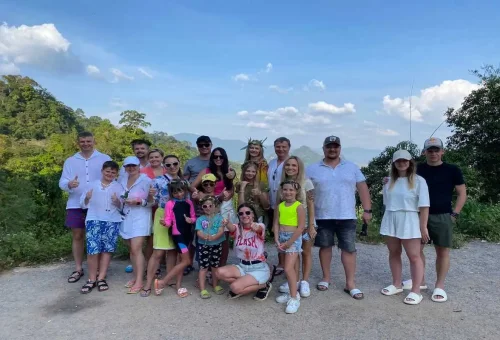 Happy group photo at Khao Sok National Park viewpoint