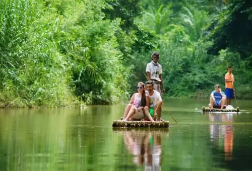 Couple on bamboo raft exploring Sok River in Khao Sok