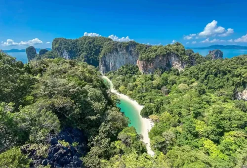 Aerial view of Hong Island’s secluded beach surrounded by lush jungle.