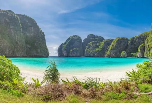 Maya Bay beach with turquoise water and limestone cliffs