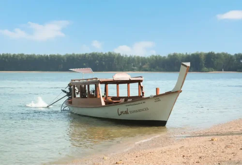 Private longtail boat departing from Phang Nga beach