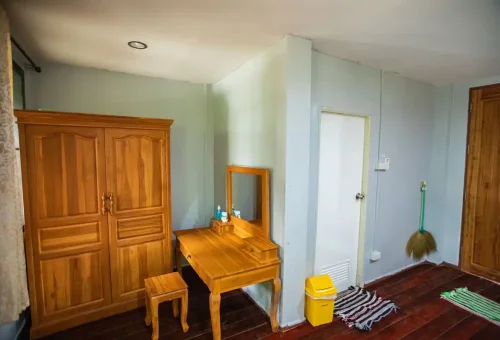 Simple wooden bungalow room at Surin Islands accommodation for overnight stay.