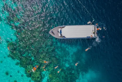 Sunset reflecting on calm ocean water at Surin Islands Thailand
