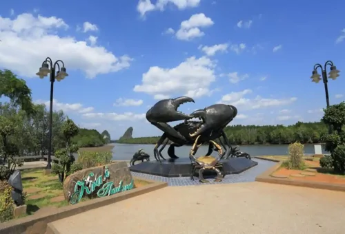 Krabi Town riverside park with crab monument
