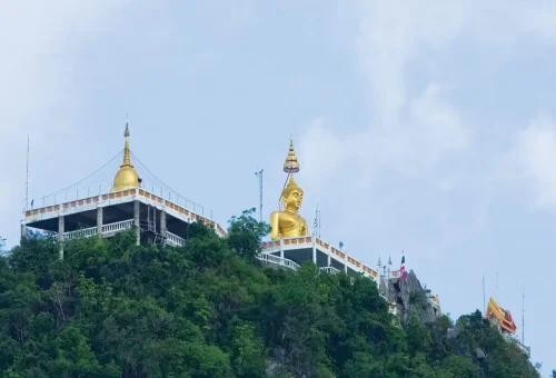 Tiger Cave Temple golden Buddha on mountain Krabi