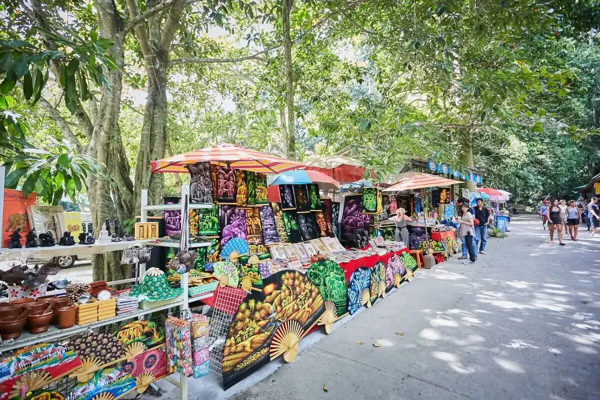 Colorful local market stalls selling handmade souvenirs and crafts in Koh Samui.