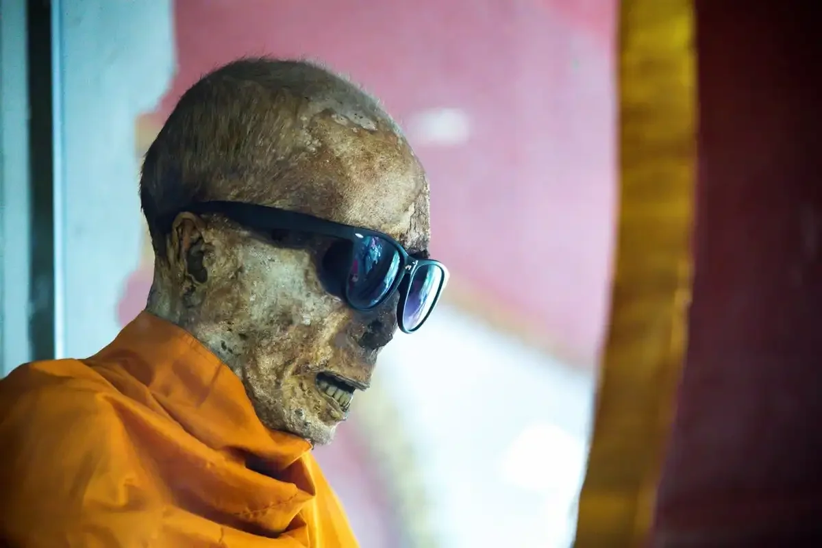 Mummified monk Luang Pho Daeng at Wat Khunaram Temple in Koh Samui.