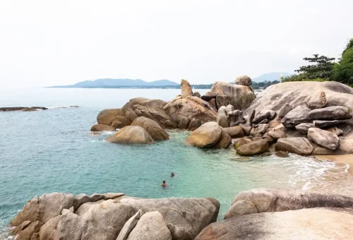 Tourists swimming near Hin Ta and Hin Yai Rocks on Koh Samui’s southern coast.