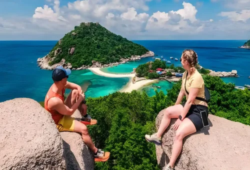 Tourists admiring the panoramic view of Koh Nangyuan’s twin islands and connecting sandbar.