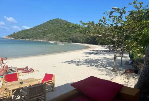 Beautiful white sandy beach and turquoise water on Koh Phangan island