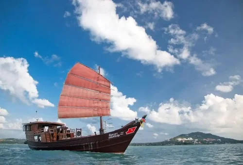 Traditional wooden sailing junk cruising from Koh Samui to Koh Phangan