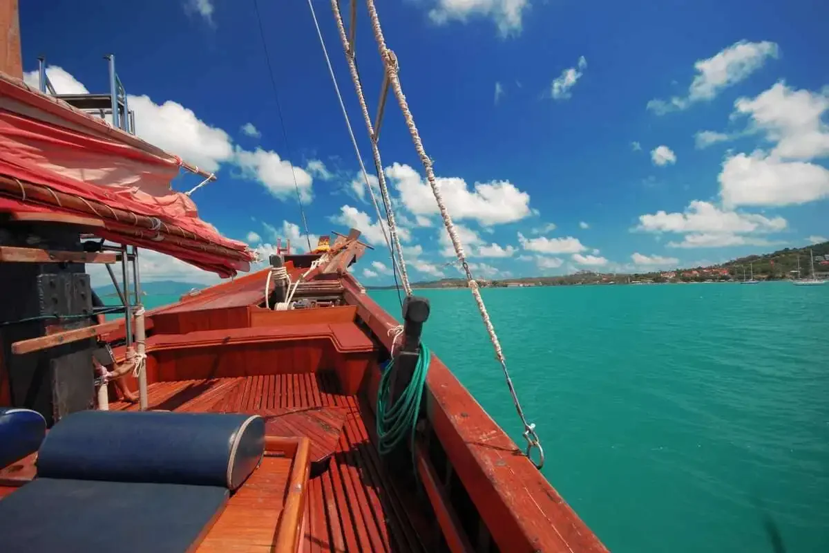 Cozy interior and deck view from Koh Phangan cruise boat