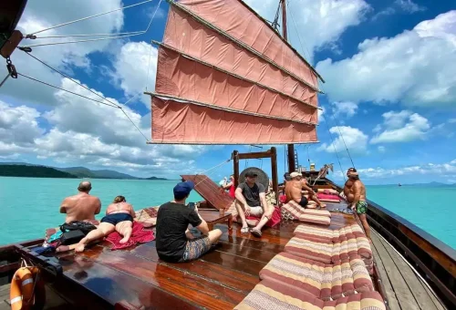 Guests relaxing on deck during Koh Phangan cruise from Samui