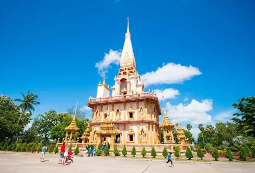 Private Phuket City Tour – visitors exploring Wat Chalong Temple, Phuket’s most sacred landmark, with Phuket Travel Store.