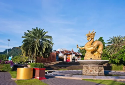 Private Phuket City Tour – Golden Dragon statue in Phuket Town, a cultural landmark included in Phuket Travel Store city tours.