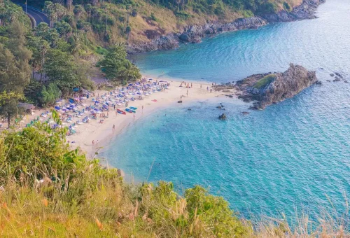 Private Phuket City Tour – view of secluded beach near Windmill Viewpoint with turquoise waters in Phuket with Phuket Travel Store.