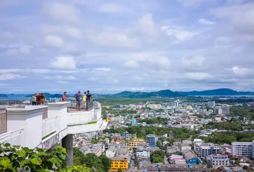 Visitors enjoying panoramic views of Phuket Town from Khao Rang Viewpoint terrace.