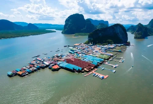 Aerial view of Koh Panyee floating village in Phang Nga Bay visited on a James Bond private speedboat tour with Phuket Travel Store.