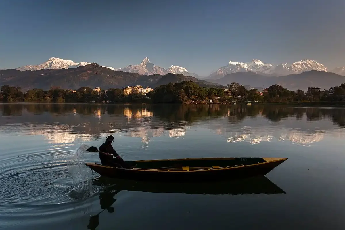 Pokhara Lake And A Boatman