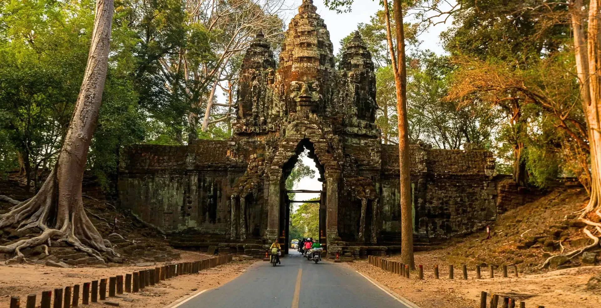 temple in Cambodia with road leading through it